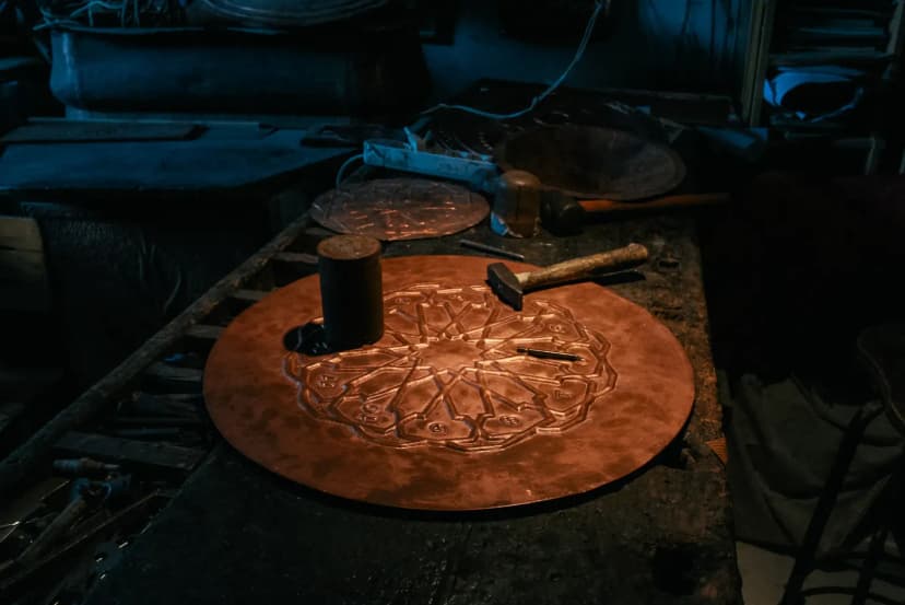 Discover detailed metalwork craftsmanship in a traditional Turkish workshop.