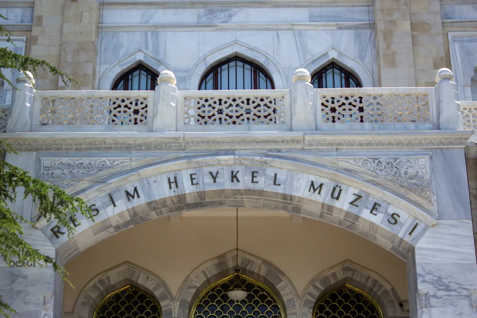 Explore the ornate entrance of Ankara's State Art and Sculpture Museum, a historic landmark in Türkiye.